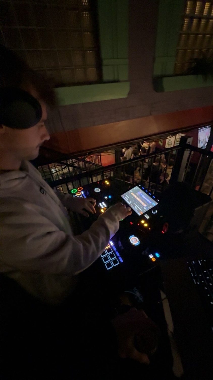 Stoakley running the decks from the booth